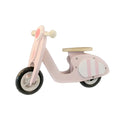 Pink wooden balance scooter for toddlers, 10 inches in size.