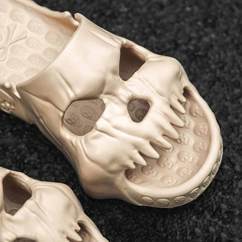 Spooky skull-patterned slide sandals in various colors, perfect for indoor and outdoor wear during the Halloween season