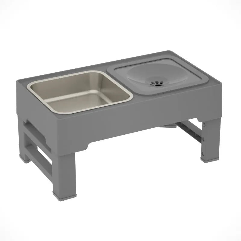 Adjustable height black and grey plastic dog feeder stand with two stainless steel bowls at medium setting