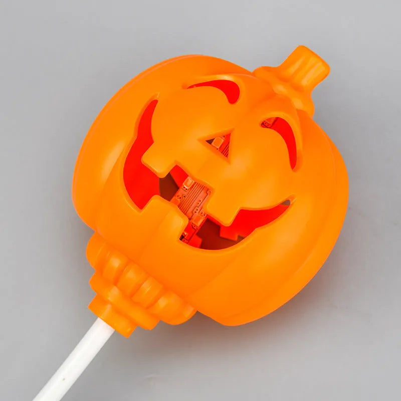 Plastic pumpkin decorative lamp with USB charging port and yellow or purple light options