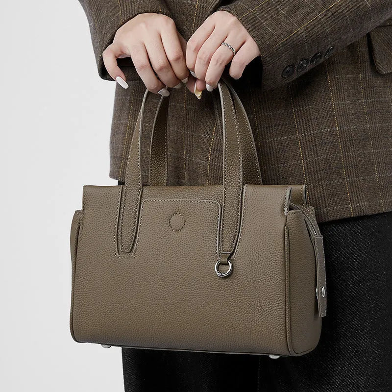 Genuine leather cowhide crossbody bag in horizontal square suitcase shape