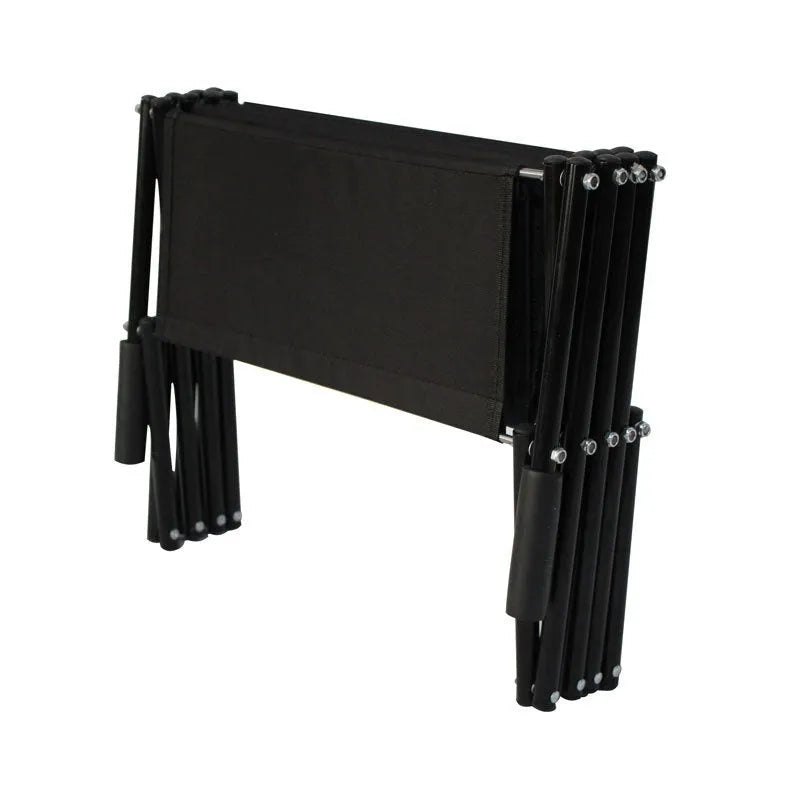 Folding stainless steel pet dog ladder in open position, showing steps, against a car boot.