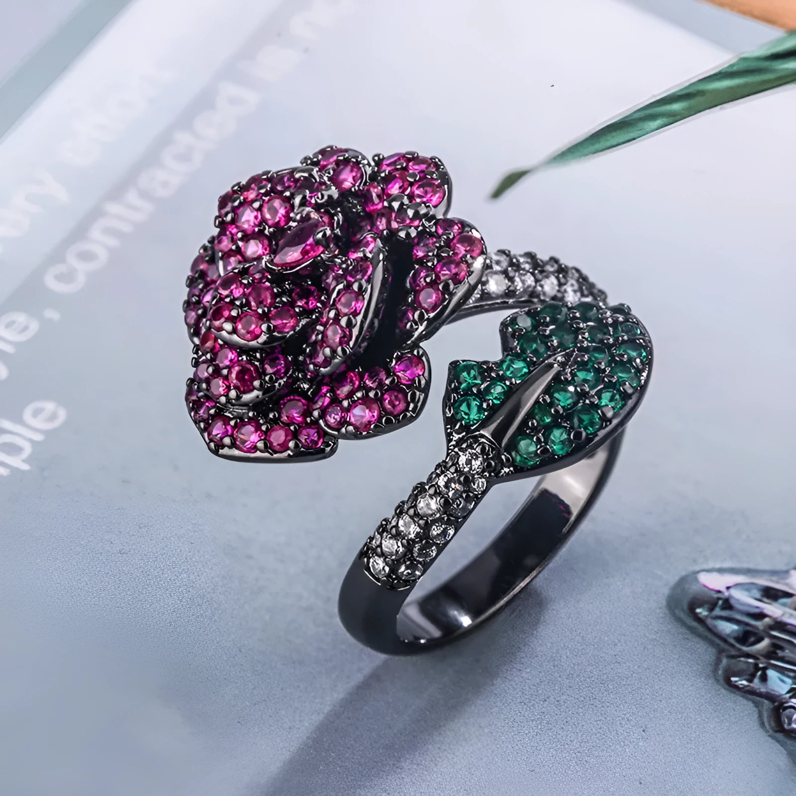 Black gold geometric flower ring with simulated red corundum stone on copper band
