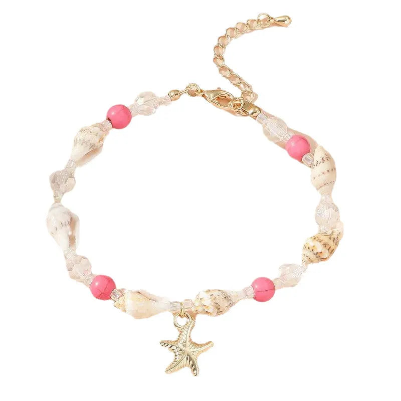 Alloy shell crystal beads bracelet with starfish pendant and conch beads on white background