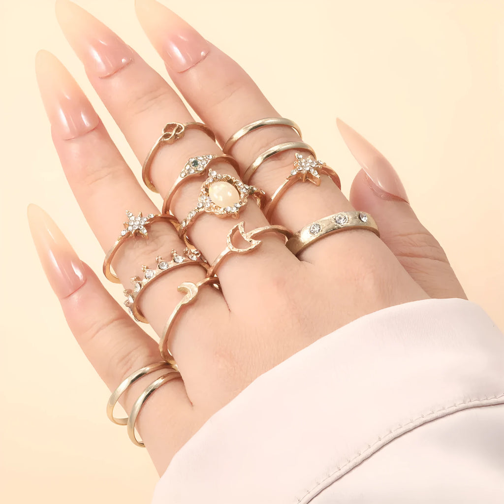 Vintage star and moon 13-piece ring set with opal and rhinestone accents in gold or silver electroplated zinc alloy