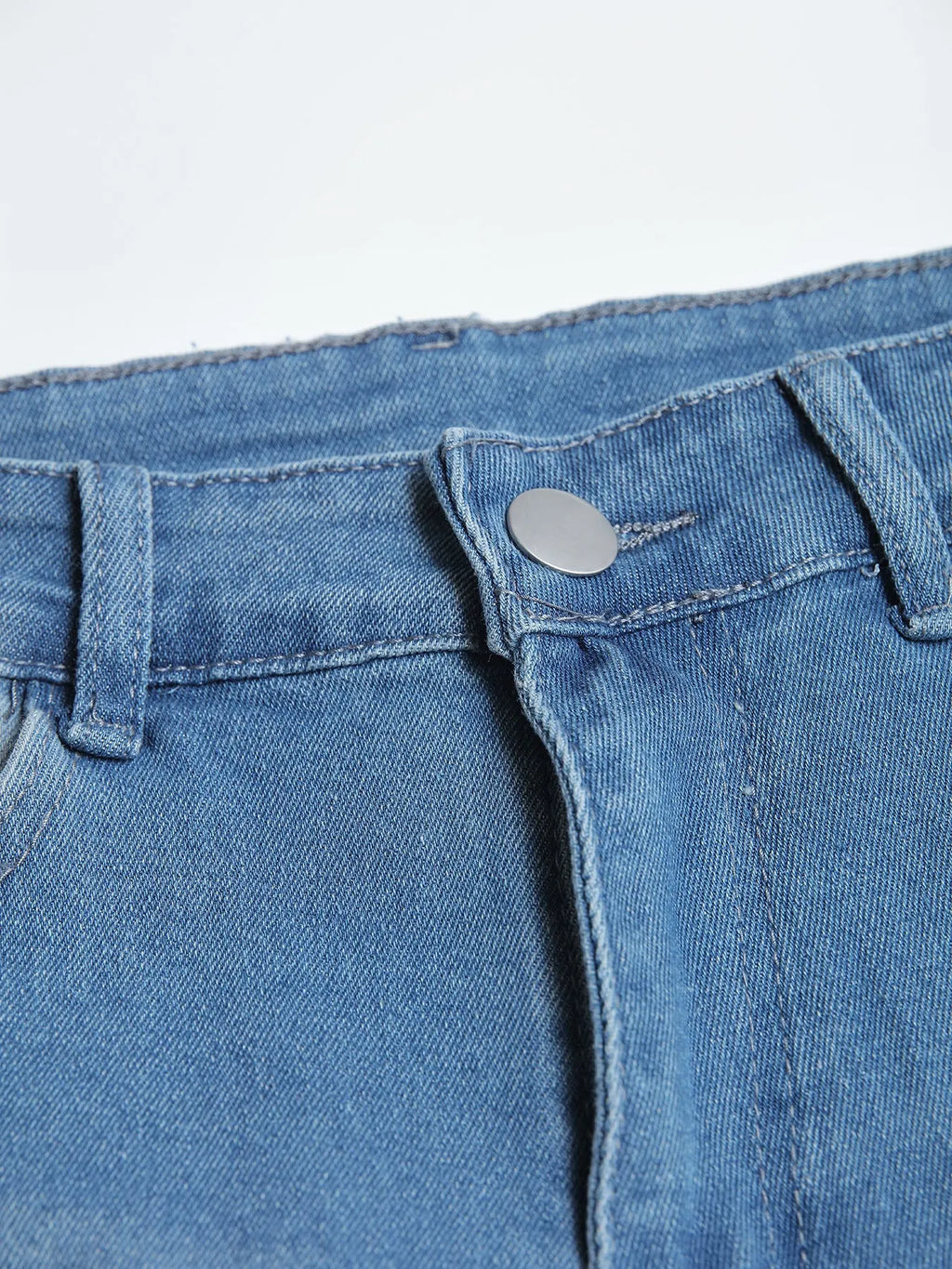 Men's blue denim skinny jeans with medium stretch, cotton fabric, side view on mannequin