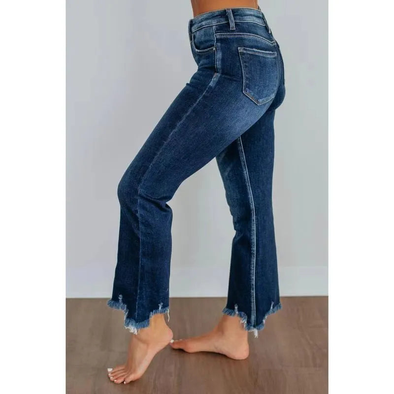 Women's solid colour denim trousers with hand-distressed detailing in dark blue