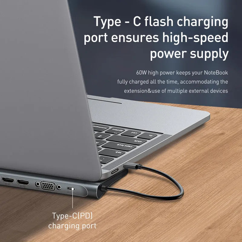 Grey aluminium docking station with cooling bracket showing ten ports including HDMI VGA and network connections