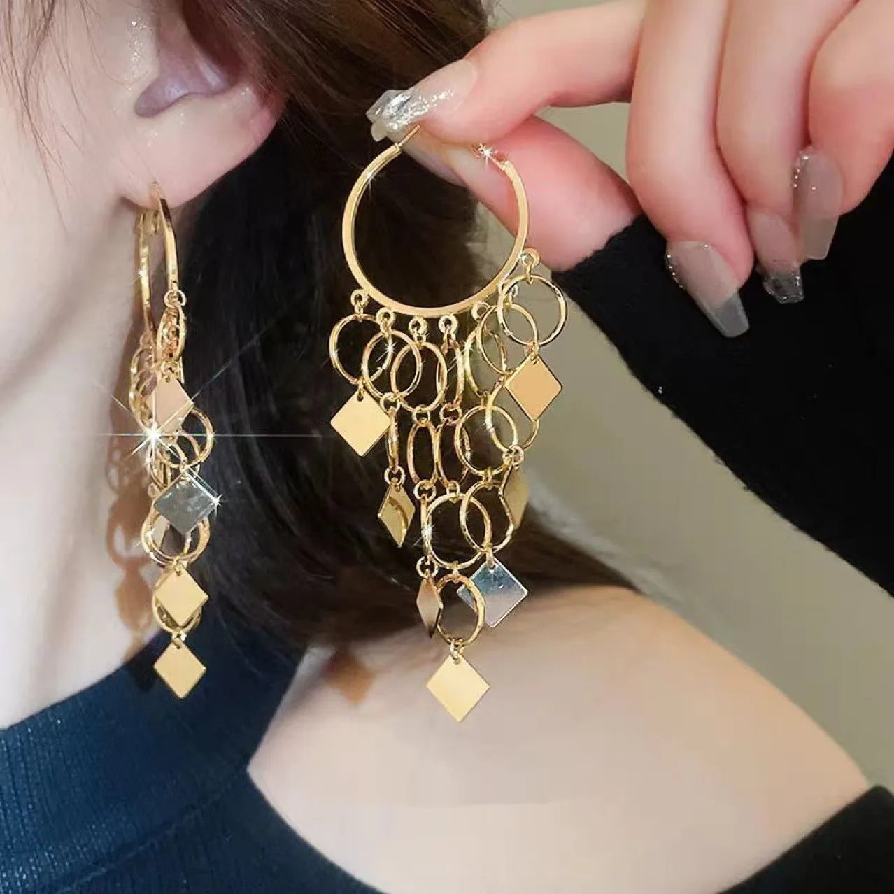 Women's diamond-shaped tassel earrings in gold or silver made from copper with electroplated finish