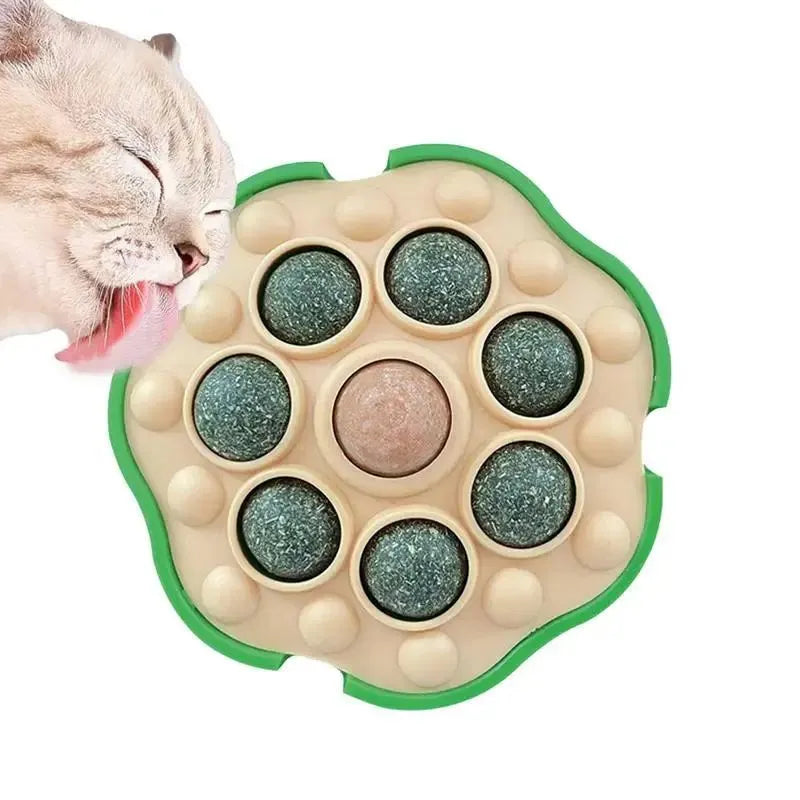 Green lotus-shaped adhesive catnip ball toy for cats, shown with dimensions approximately 10.5cm.