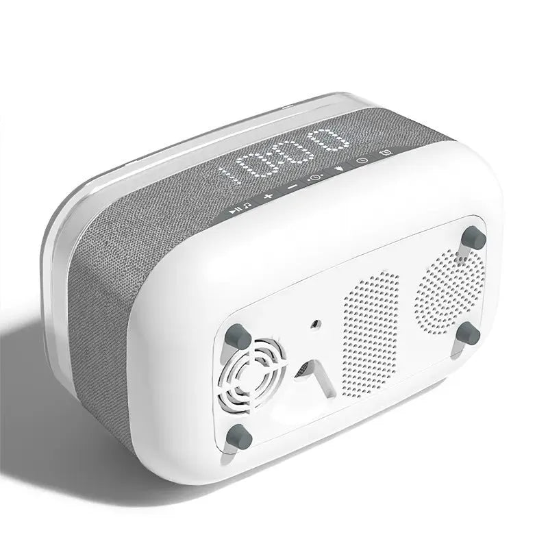 White multifunctional alarm clock with Bluetooth speaker, wireless charging pad, and ambient night light.