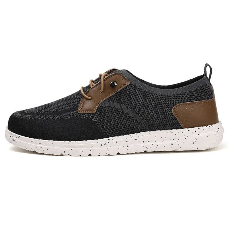 Men's black laceless canvas shoes with low-top design and round toe