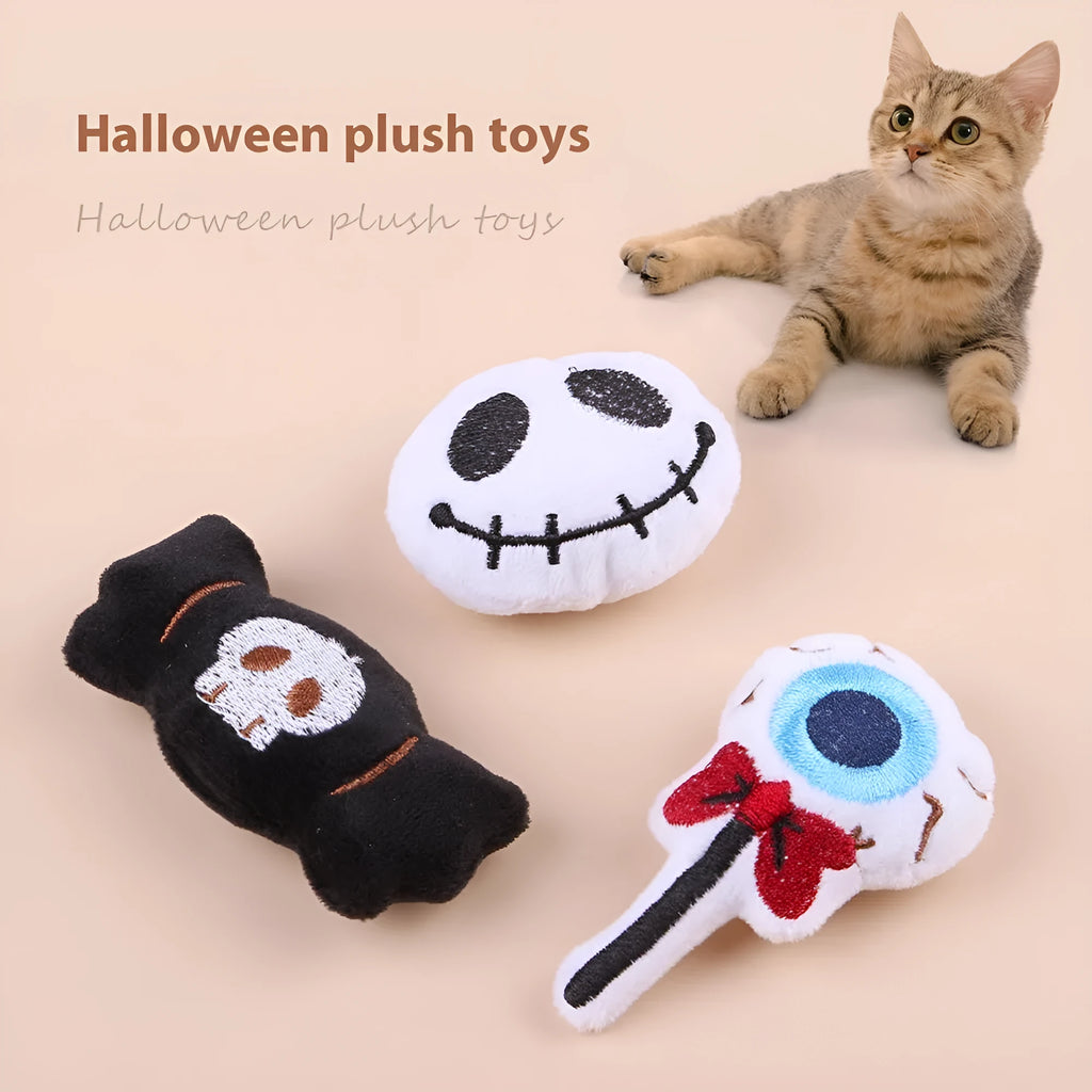 Plush cat teaser wand with candy-shaped attachment for interactive play