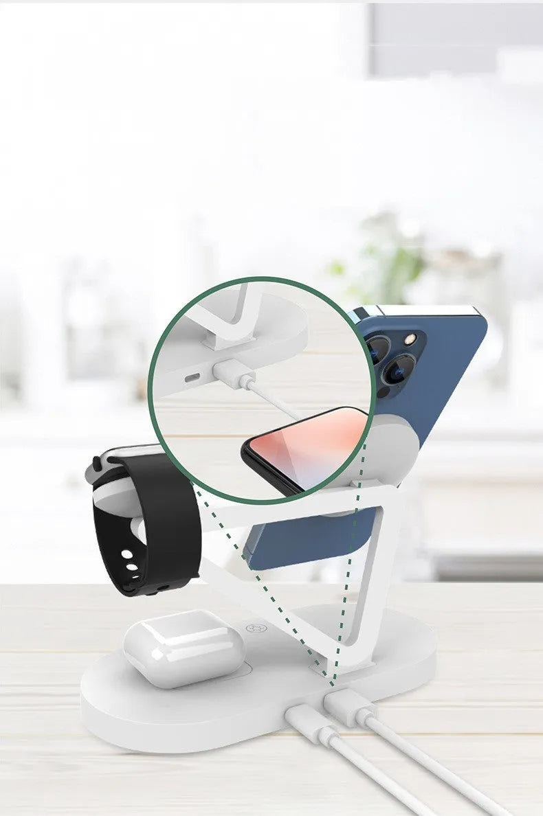 Black wireless charging station showing an iPhone, Apple Watch, and AirPods charging simultaneously on magnetic pads.