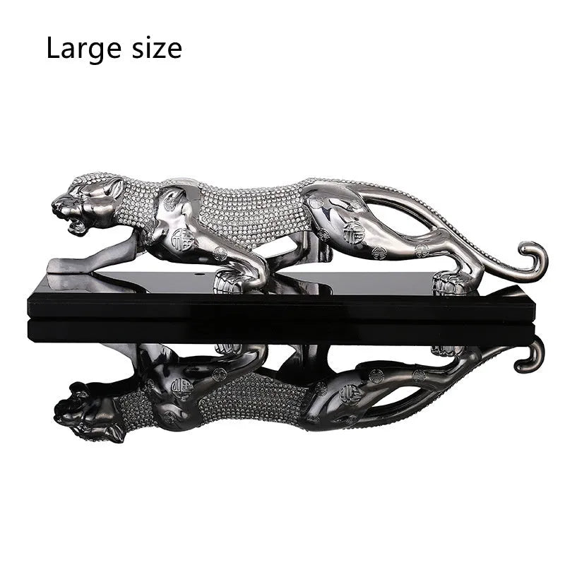 Leopard car perfume ornament made of alloy crystal base plate and resin in gold finish on car dashboard