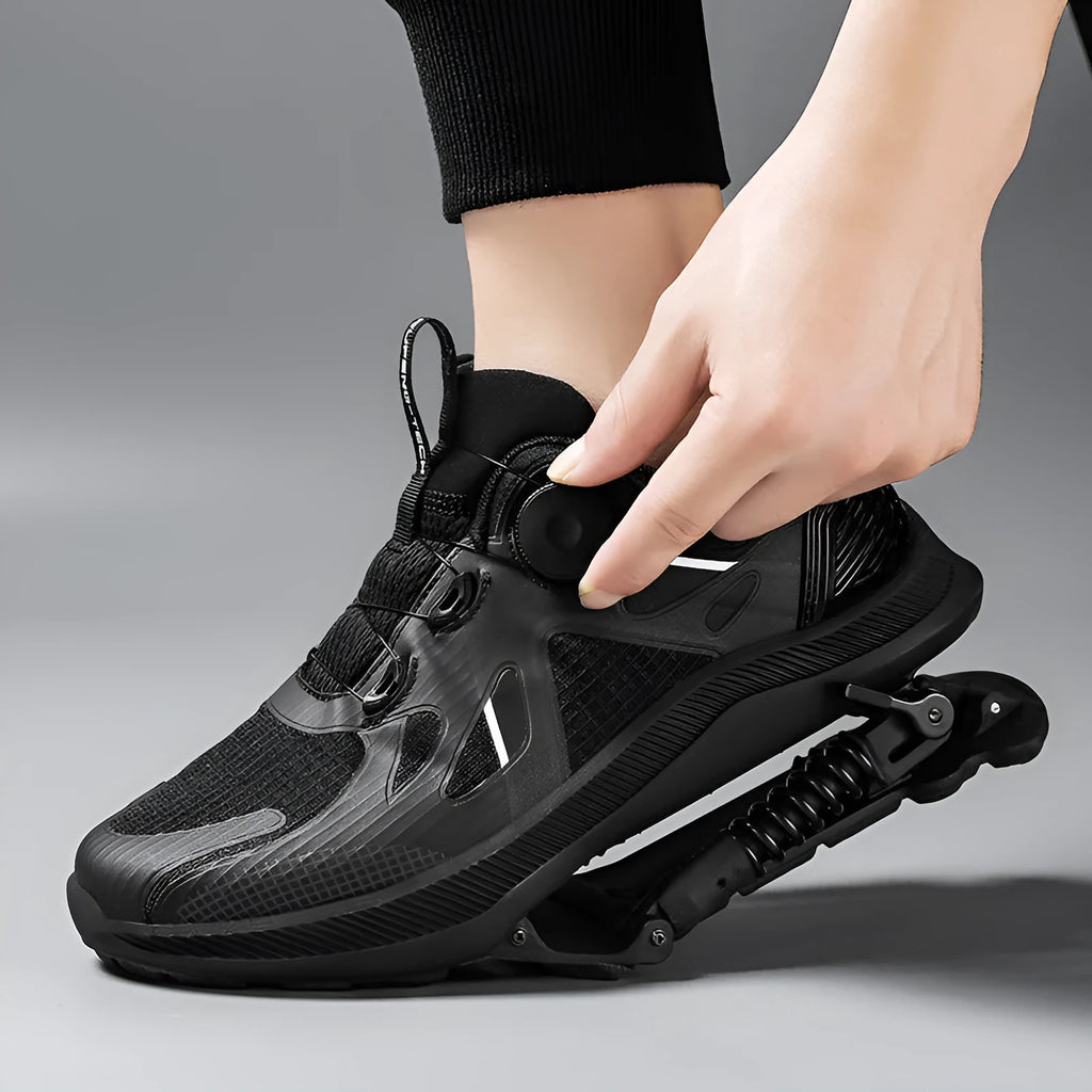Black running shoes with mesh upper and buckle closure, showing leather stitching details and rubber EVA sole