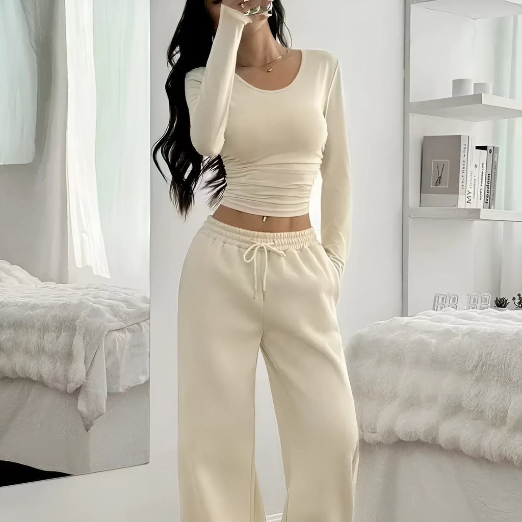 Women's long sleeve solid colour vest and pants suit in beige white polyester knit, sizes S to XL