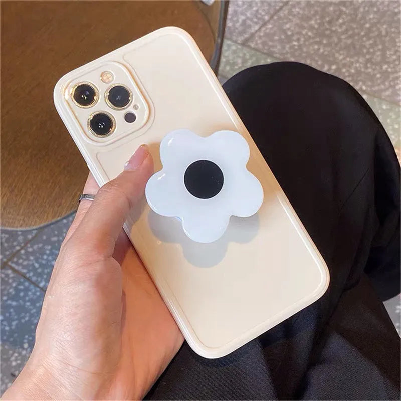 Cute flower phone case in pink or white for iPhone models, non-Apple brand, single case