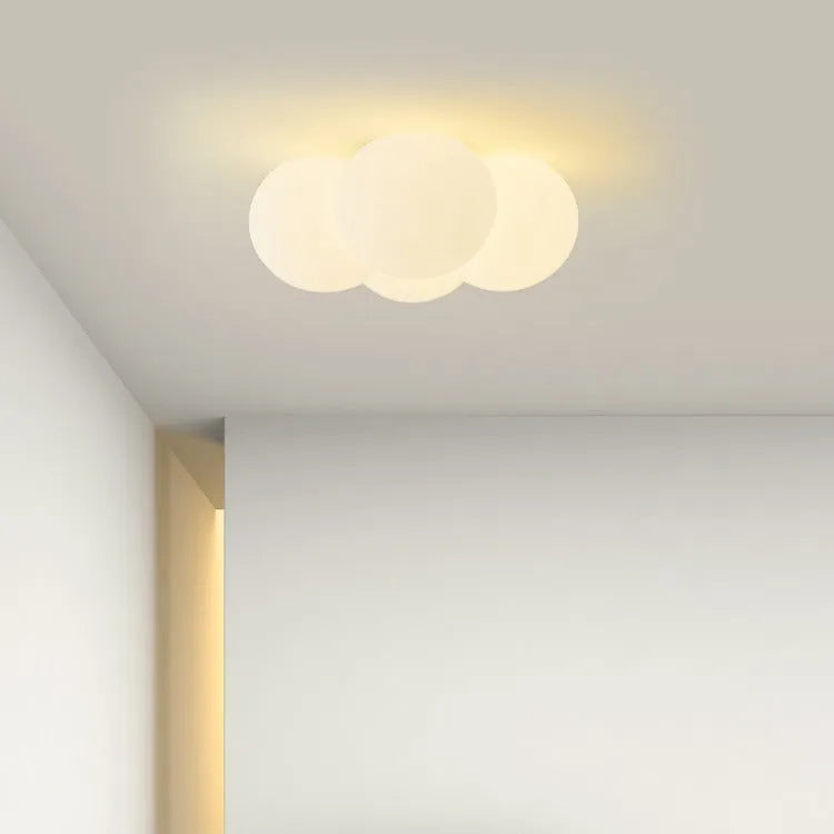Modern cloud-shaped chandelier with four heads and tricolour lighting for ceiling installation