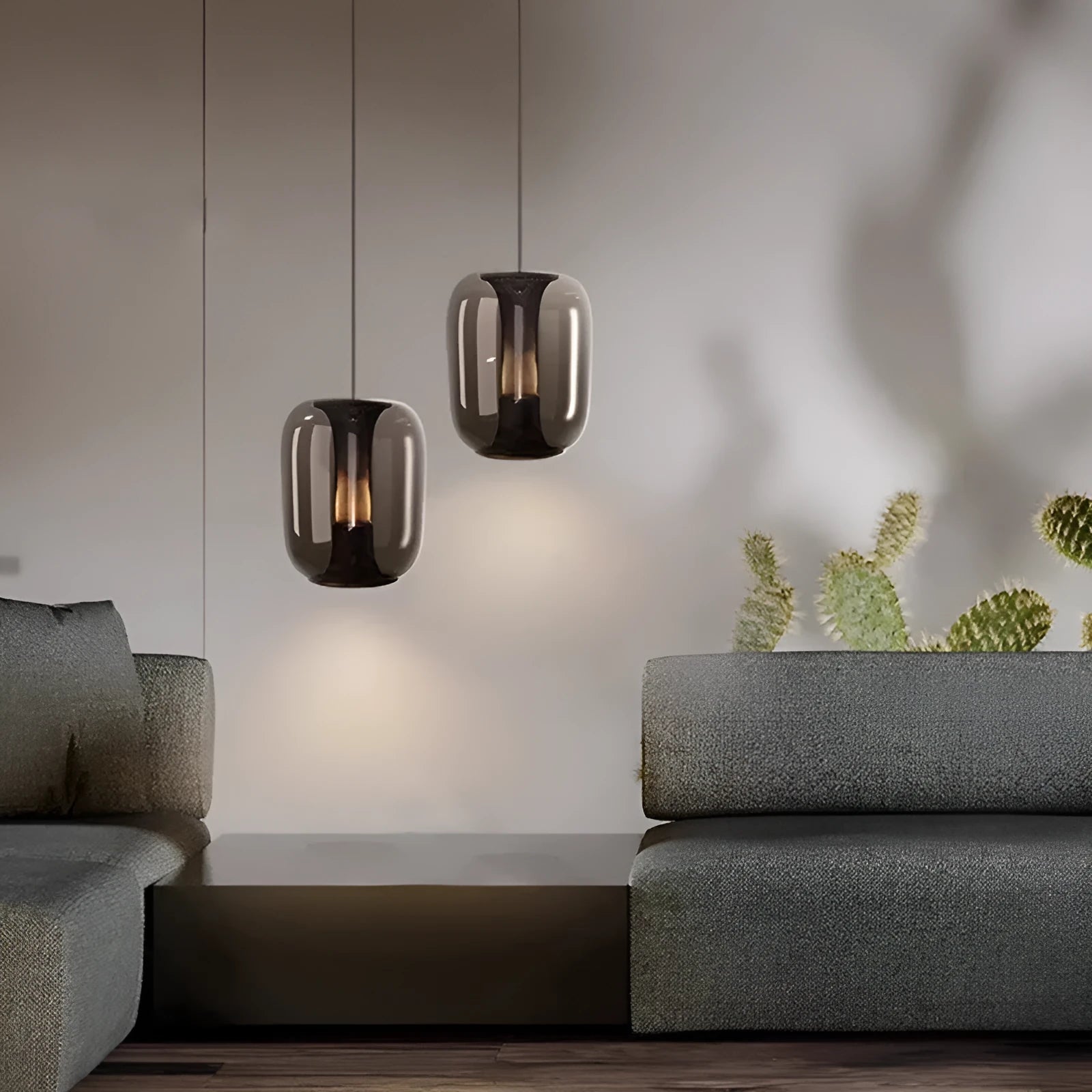 Nordic minimalist chandelier with 16cm diameter shown in transparent, cognac, and smoky grey colour options