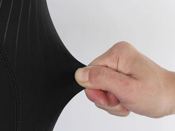 Black shock-absorbing cycling pants with seven-inch length and double pockets for road and mountain biking