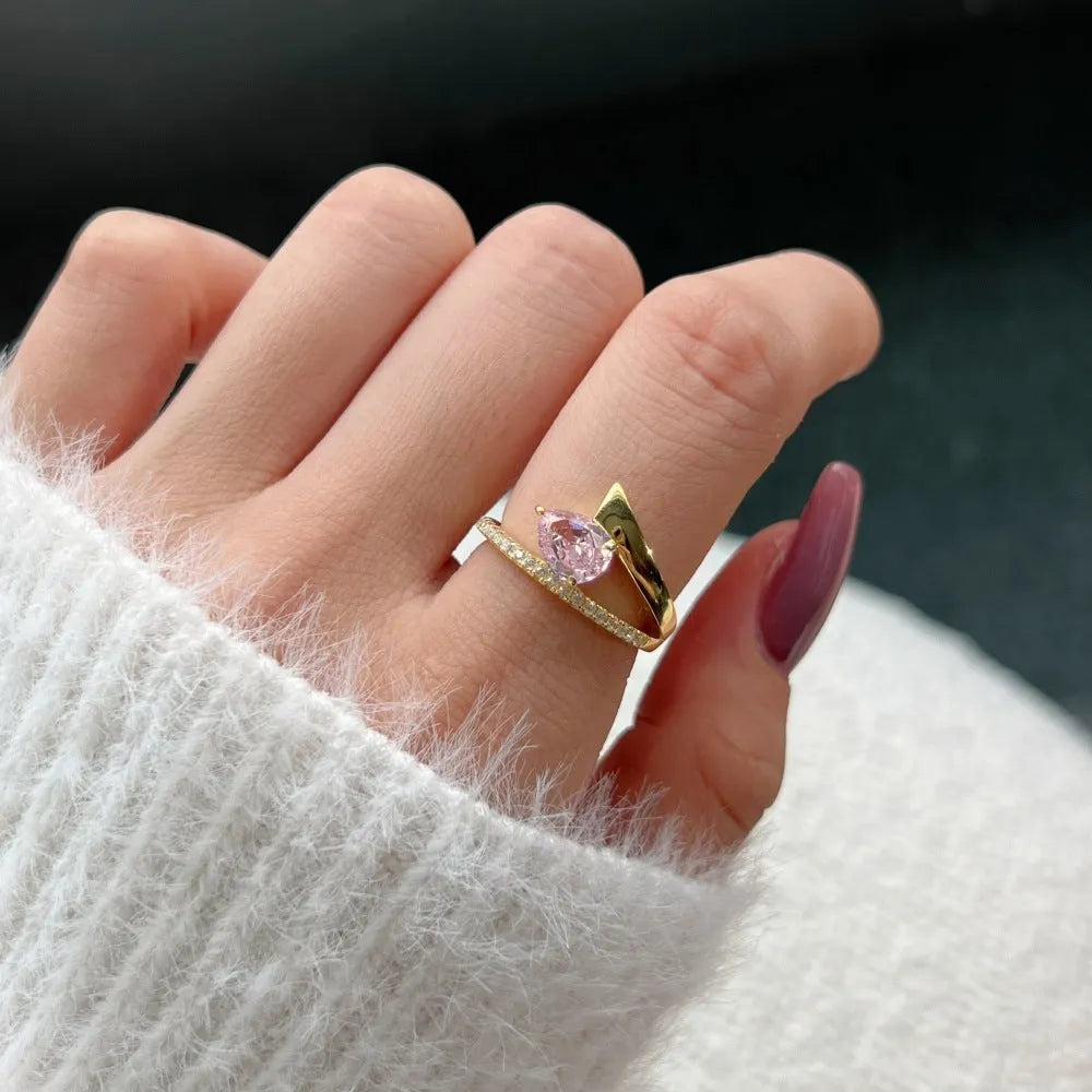Women's silver water drop diamond ring with electroplated finish, geometric drop shape, golden pink diamond colour option