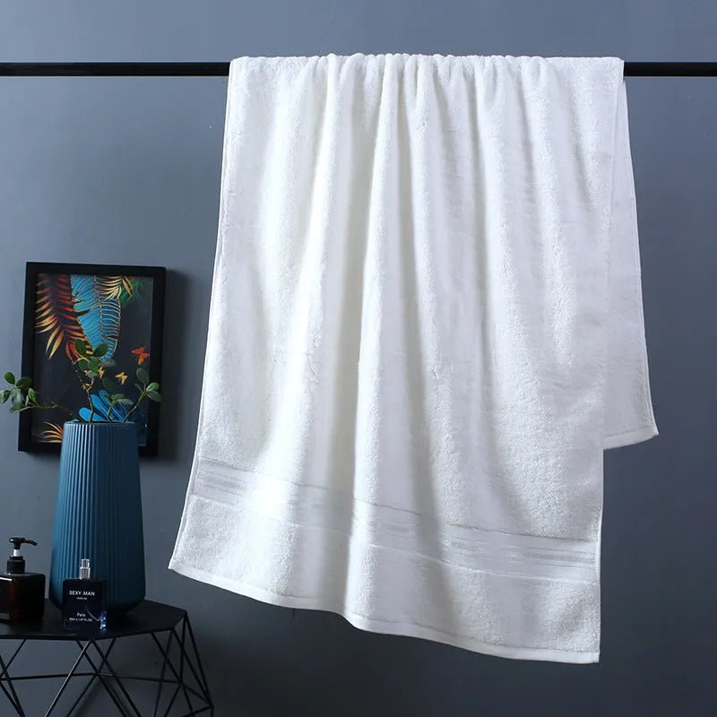 Pure cotton three-piece towel set showing bath towel, hand towel and square scarf in a blue colour.