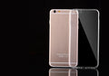Transparent TPU soft shell mobile phone case for iPhone on a flat surface.