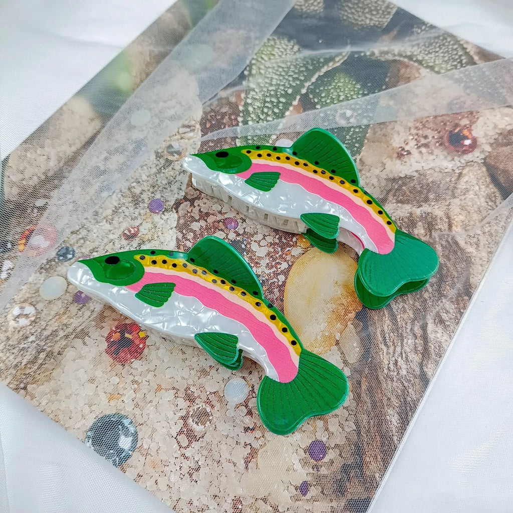 Dark green PVC hair clip with a printed design of a rainbow trout and a carp.