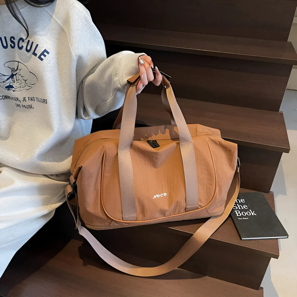 Oxford cloth yoga crossbody bag in beige, black, or brown with one shoulder strap