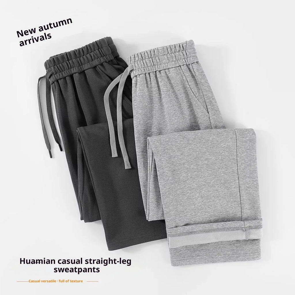 High-waisted straight-leg cotton trousers in loose fit, shown in available colours, sizes M to 3XL
