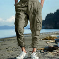 Men's linen casual trousers with ankle ties and multiple pockets in solid colour