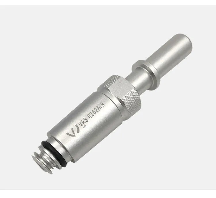 Silver metal transmission refuelling joint tool for VAS6262-9 on a workshop bench.