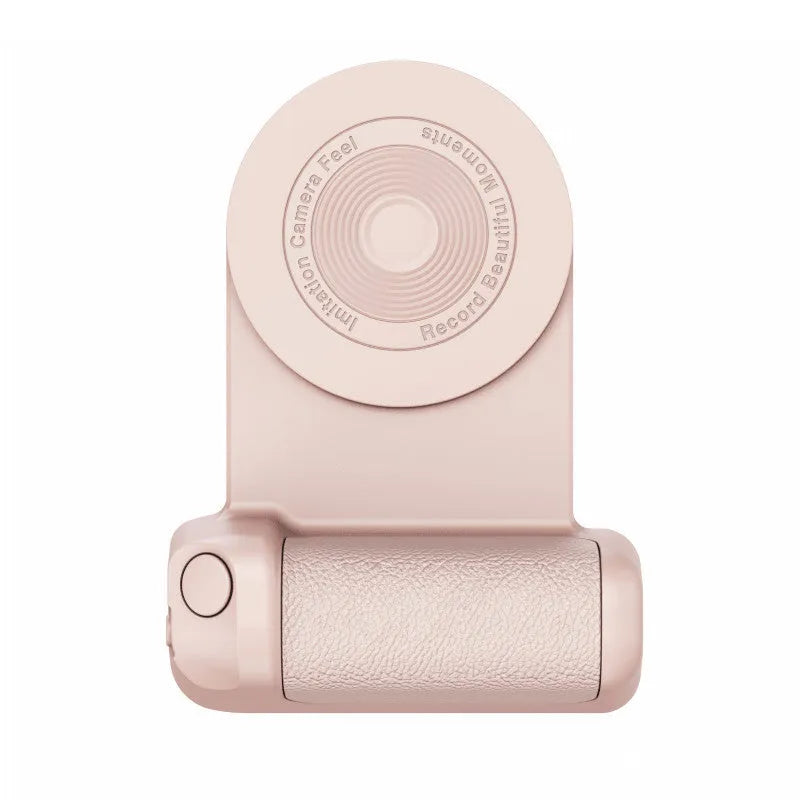 Black magnetic phone camera holder with rotatable grip on wooden table demonstrating phone attachment