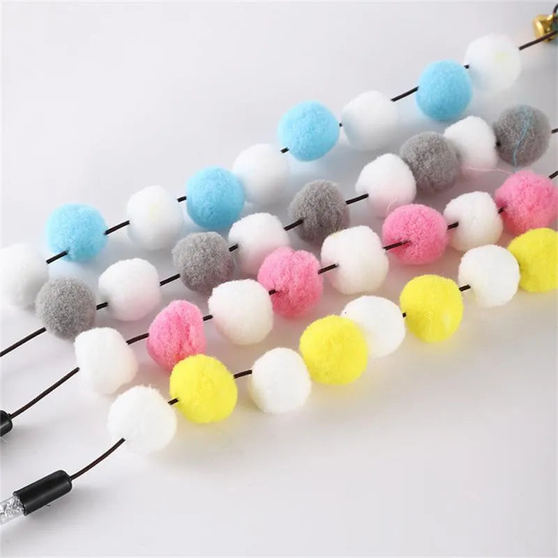31cm long cat teaser rod with coloured acrylic pompons, feathers and bell attachment