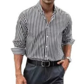 Man wearing a loose-fit striped button shirt in a casual cardigan style
