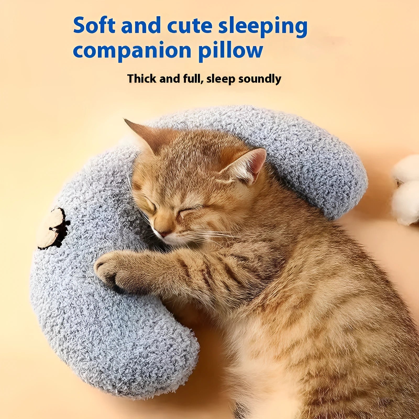 Blue and yellow cat sleeping mats with U-shaped neck pillows in moon and question mark shapes on a white background.