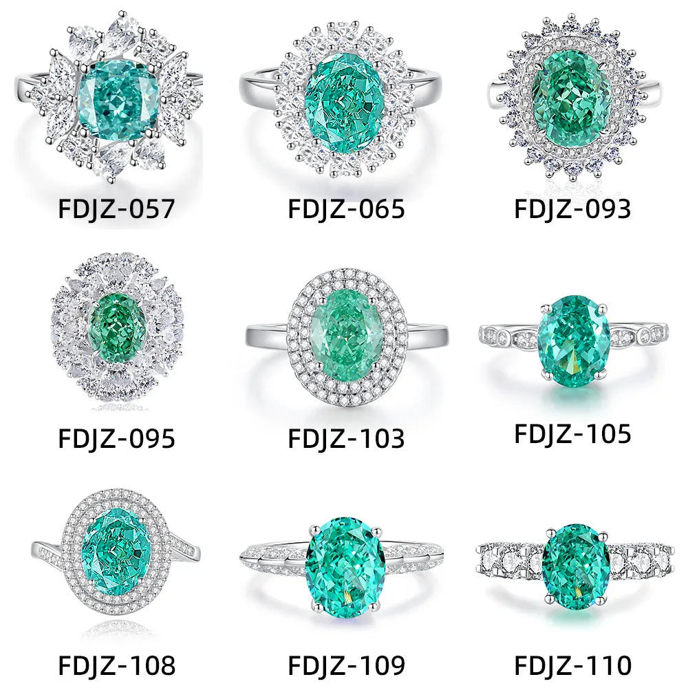 S925 silver ring with an inlaid green emerald stone and sparkling diamond detailing on a geometric band.