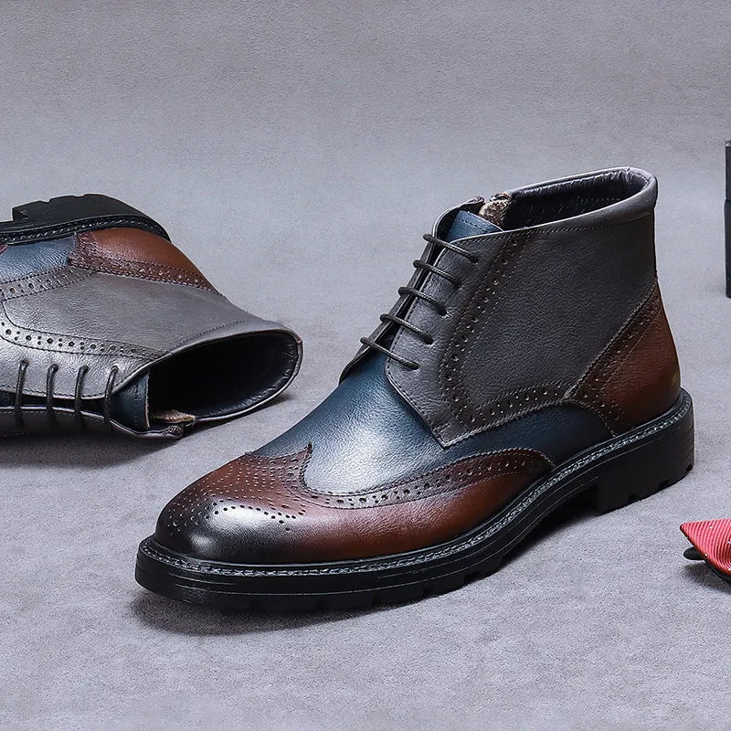 Men's curry blue leather brogue boots with colour blocking and carved stitching details on a low square heel.