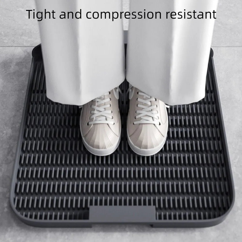 Large black cat litter pedal with slanted mouth design and textured surface for litter containment