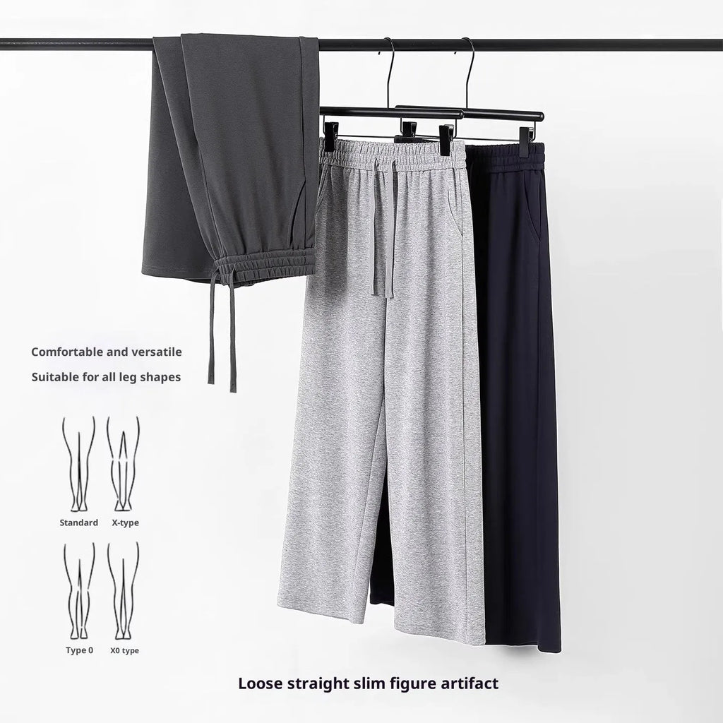 High-waisted straight-leg cotton trousers in loose fit, shown in available colours, sizes M to 3XL