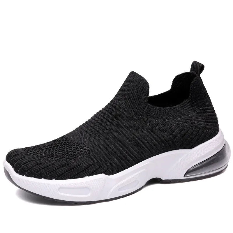 Slip-on sock shoes with mesh lining and lightweight PVC sole in black, white, khaki and pink colours