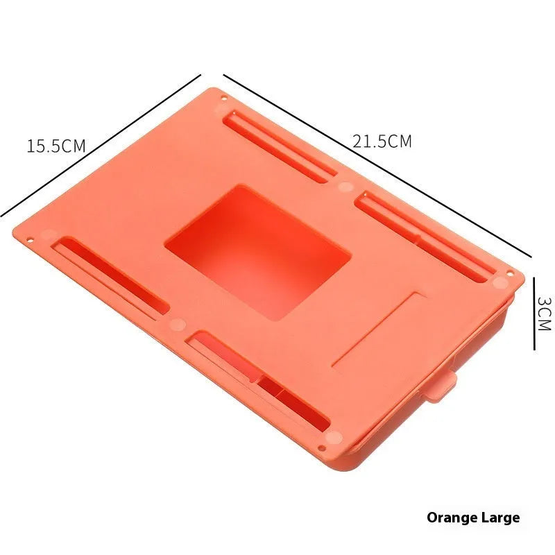 White adhesive under-table storage drawer with grid pattern mounted beneath a wooden desk.