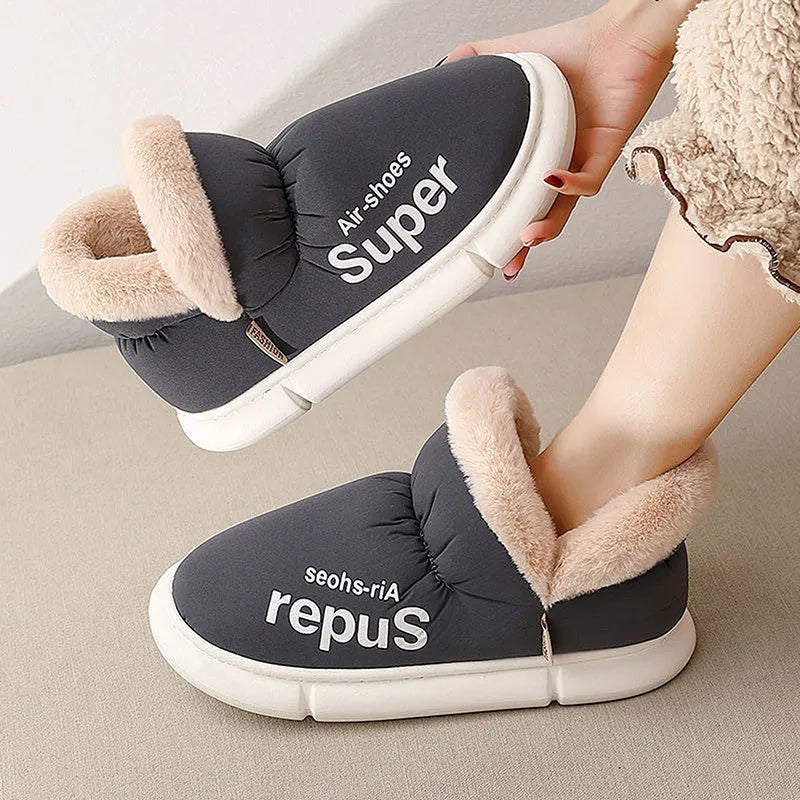 Warm house slippers with plush fleece lining and high back heel, shown in assorted colours.