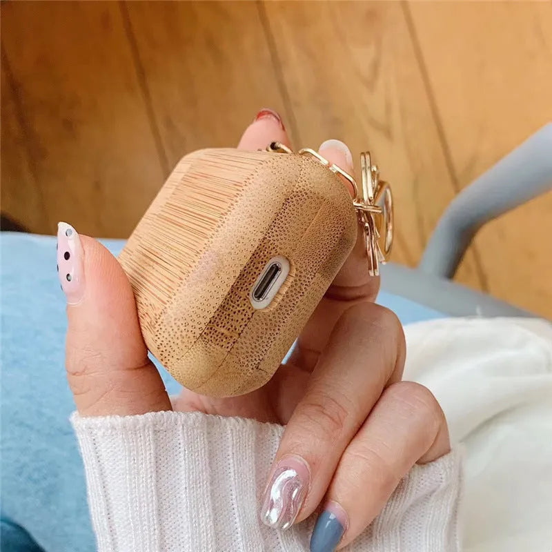 Wood grain AirPods case cover in carbonised wood colour with clamshell design
