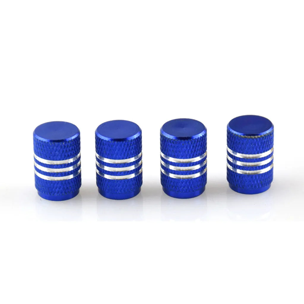 Set of aluminium alloy car tyre valve caps in multiple colours including red, blue, silver, and black.