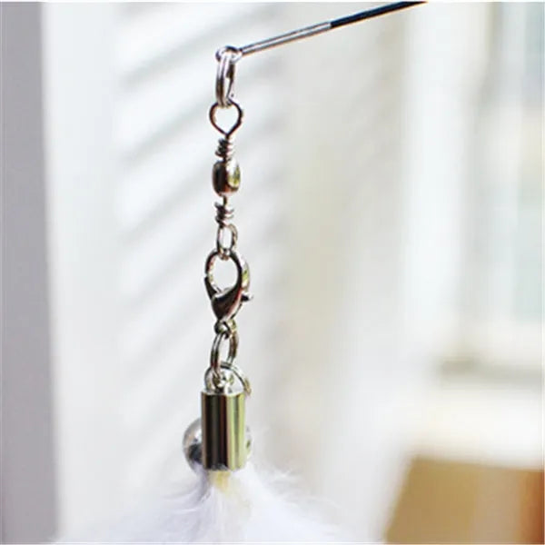 Funny cat stick with wooden handle, flexible rod, and black and white fur replacement head with feather and bell