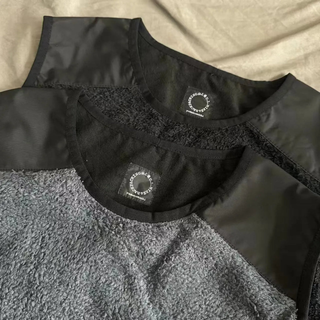 Men's lightweight fleece lined thermal vest in black, solid colour, loose fit, front view