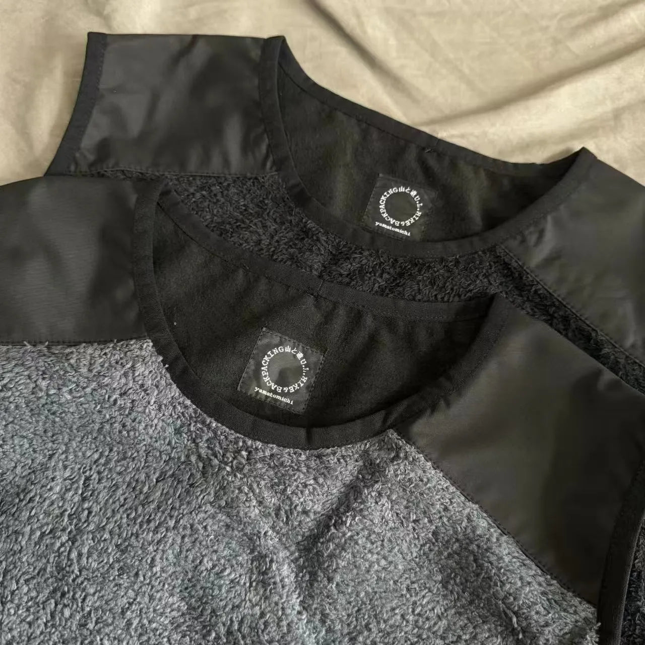 Men's lightweight fleece lined thermal vest in black, solid colour, loose fit, front view