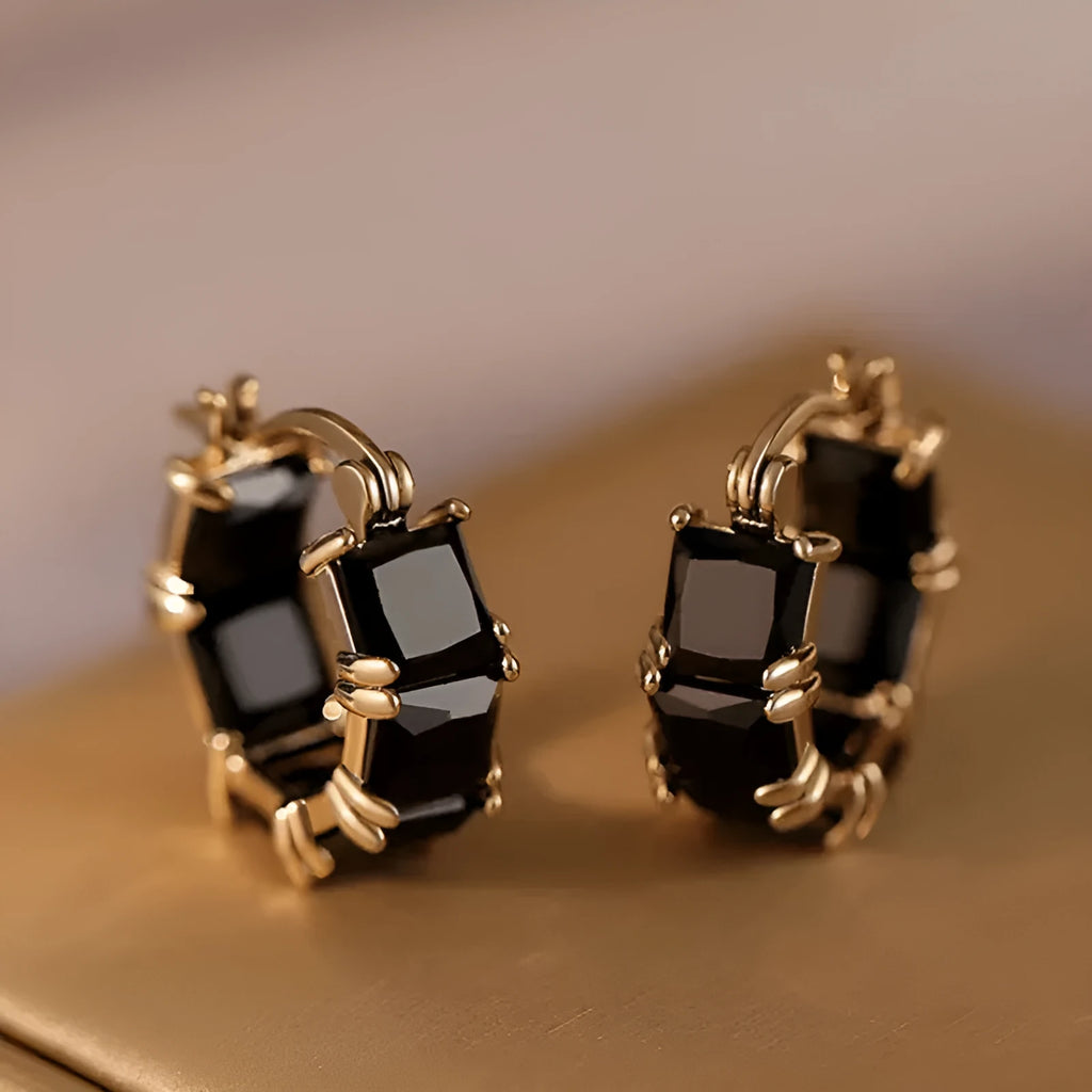 Fashionable geometric U-shaped ear rings with zircon stones and gold settings